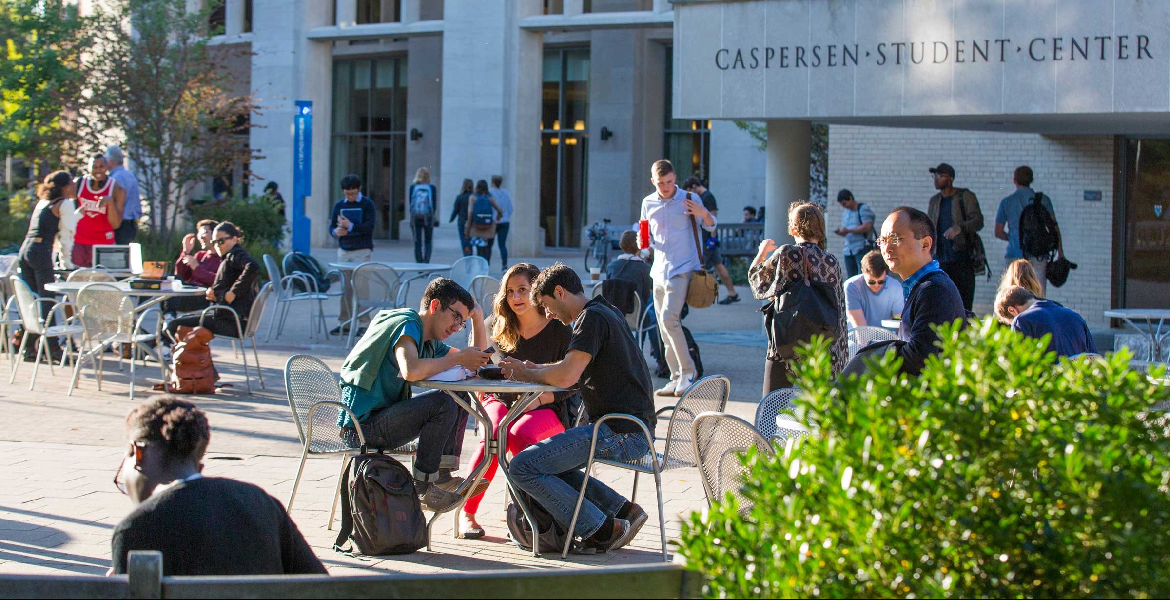 Students sitting at an outdoor table